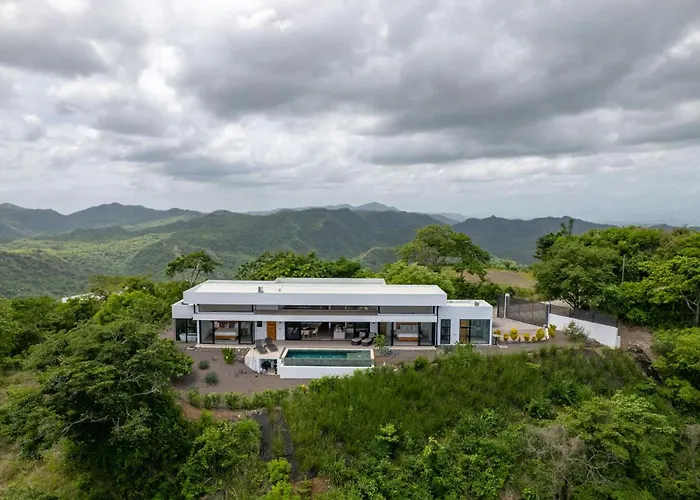 Mountainside Home With Modern Design Sweeping Ocean Views & Private Swimming Pool